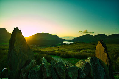 Panoramic view of landscape against sky during sunset