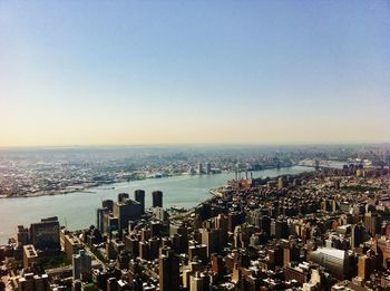 Aerial view of cityscape against clear sky