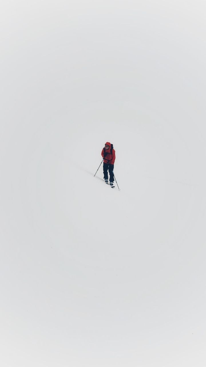 PERSON SKIING IN SNOW DURING WINTER