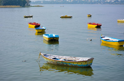 High angle view of boats moored in lake