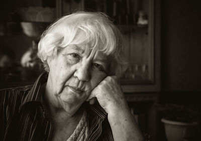 Portrait of senior woman at home