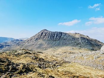 Scenic view of mountain range against sky