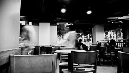 Empty chairs in restaurant