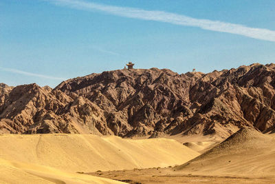 Scenic view of desert against sky