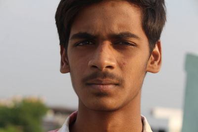 Close-up portrait of young man