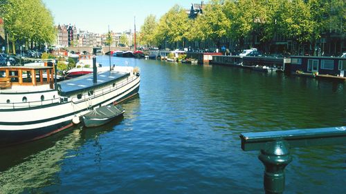 Boats moored in canal