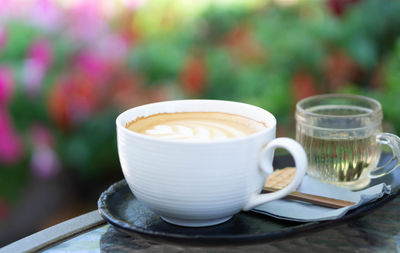 Close-up of coffee cup on table