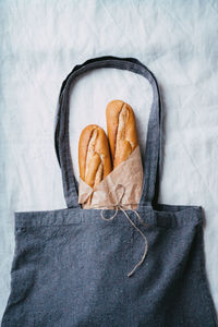 High angle view of bread on cutting board