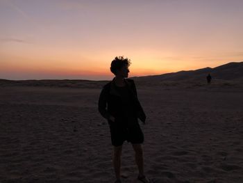 Man at sunset in great sand dunes national park