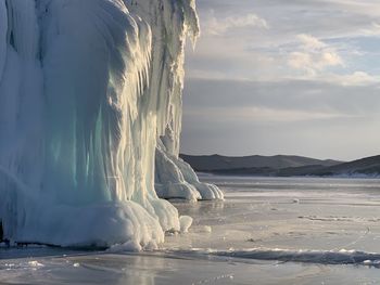 Scenic view of frozen sea against sky