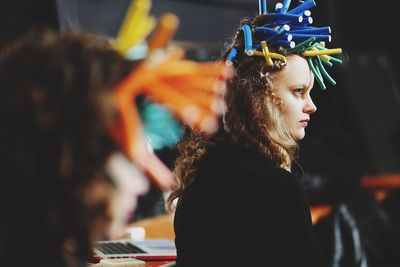 Close-up of woman looking at music concert