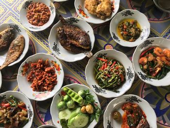 High angle view of food served on table