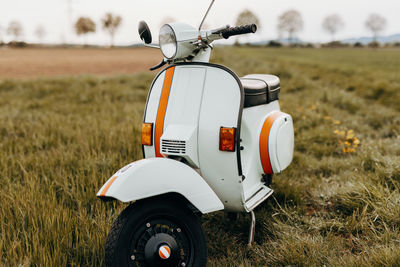 Restored old vespa in mint green and vintage style decor