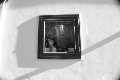 Reflection of building on window