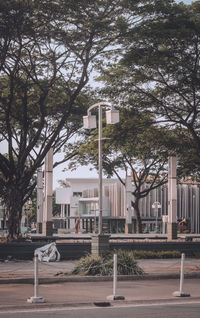 Road by buildings in city