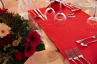 High angle view of flower bouquet by place setting