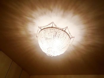 Low angle view of illuminated ceiling