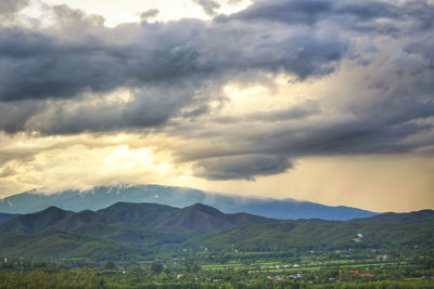 Scenic view of landscape against sky during sunset