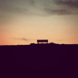 Scenic view of landscape at sunset