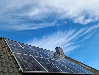 Low angle view of solar panel against sky