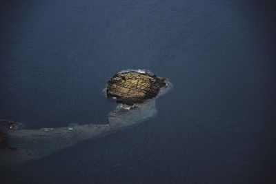 High angle view of rock formation on beach