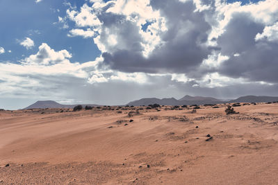 Scenic view of desert against sky
