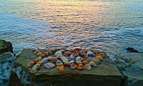 View of pebbles in calm sea