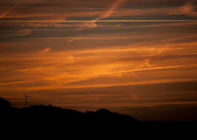 Scenic view of landscape against sky during sunset