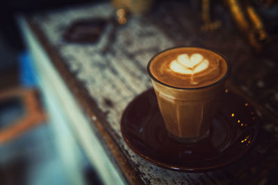 High angle view of coffee cup on table