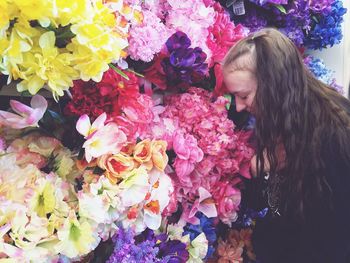 Full length of woman with flowers