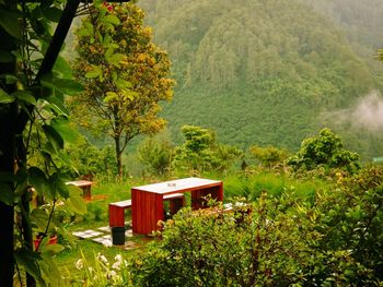 Built structure on landscape against mountain