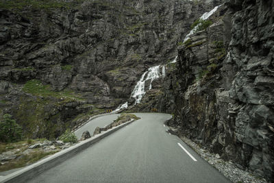 Road amidst rocky mountains