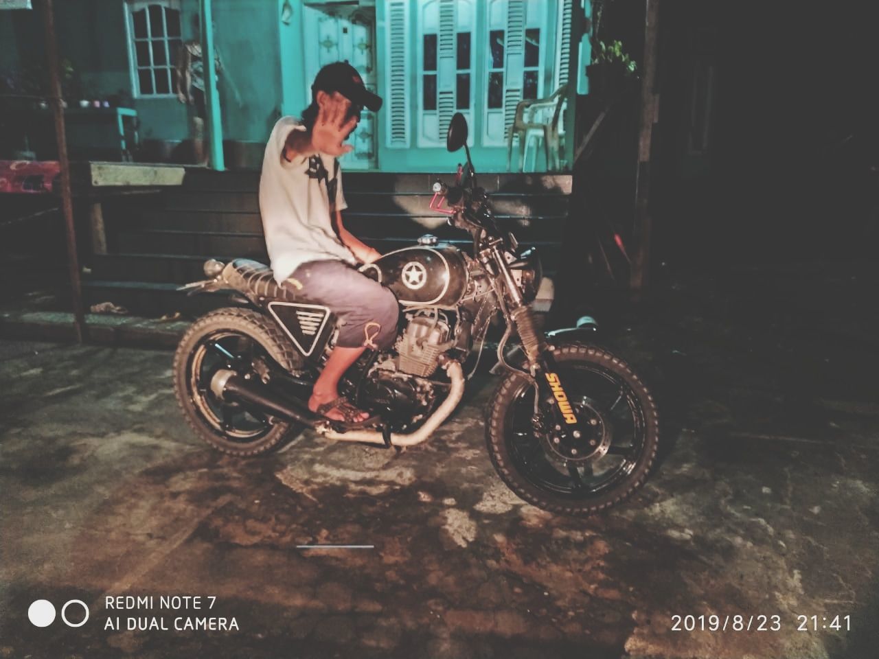 transportation, mode of transportation, land vehicle, one person, real people, full length, motorcycle, lifestyles, ride, men, riding, casual clothing, leisure activity, bicycle, side view, sitting, city, sport, architecture, outdoors, biker