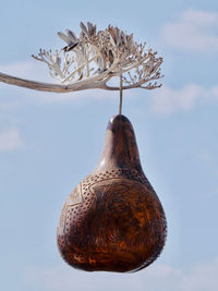 Woodart hanging on a tree