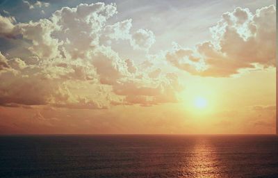 Scenic view of sea at sunset