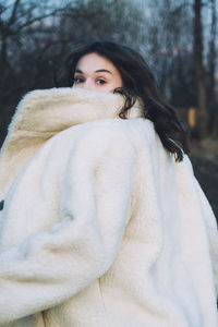 Portrait of woman in snow