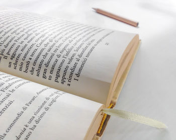 High angle view of open book on table