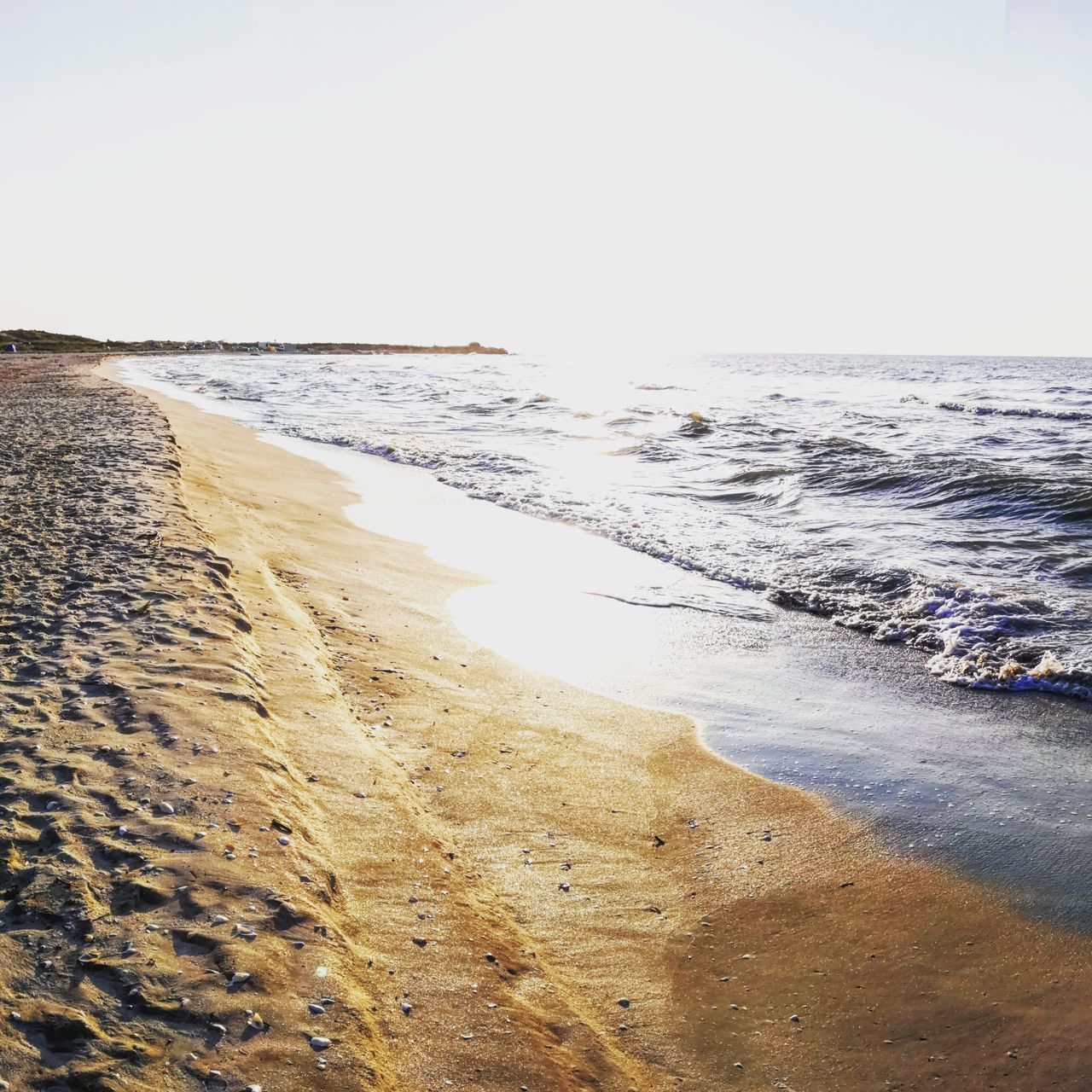 VIEW OF BEACH AGAINST CLEAR SKY