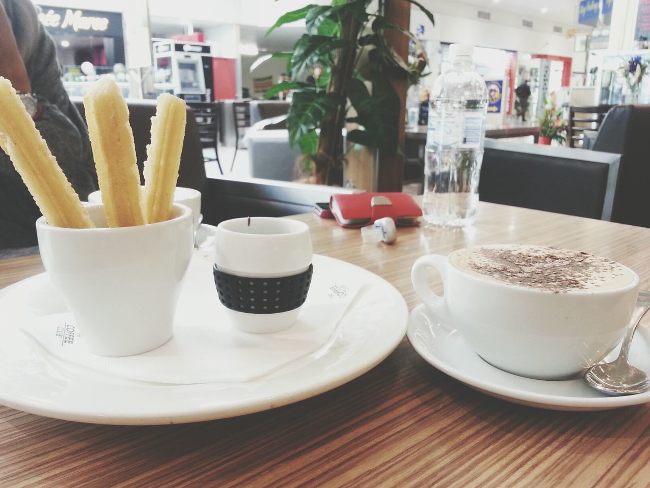 food and drink, indoors, table, drink, freshness, refreshment, still life, coffee cup, restaurant, drinking glass, food, coffee - drink, plate, saucer, close-up, coffee, cafe, cup, ready-to-eat, healthy eating