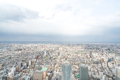 High angle view of buildings against sky in city