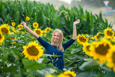 Portrait of woman with yellow flowers