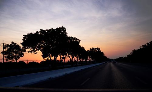 Empty road at sunset