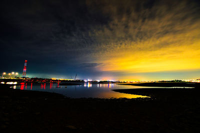 Scenic view of sea against sky at night