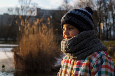 Portrait of girl standing in snow