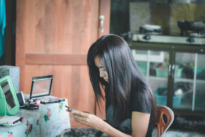 Woman working on table