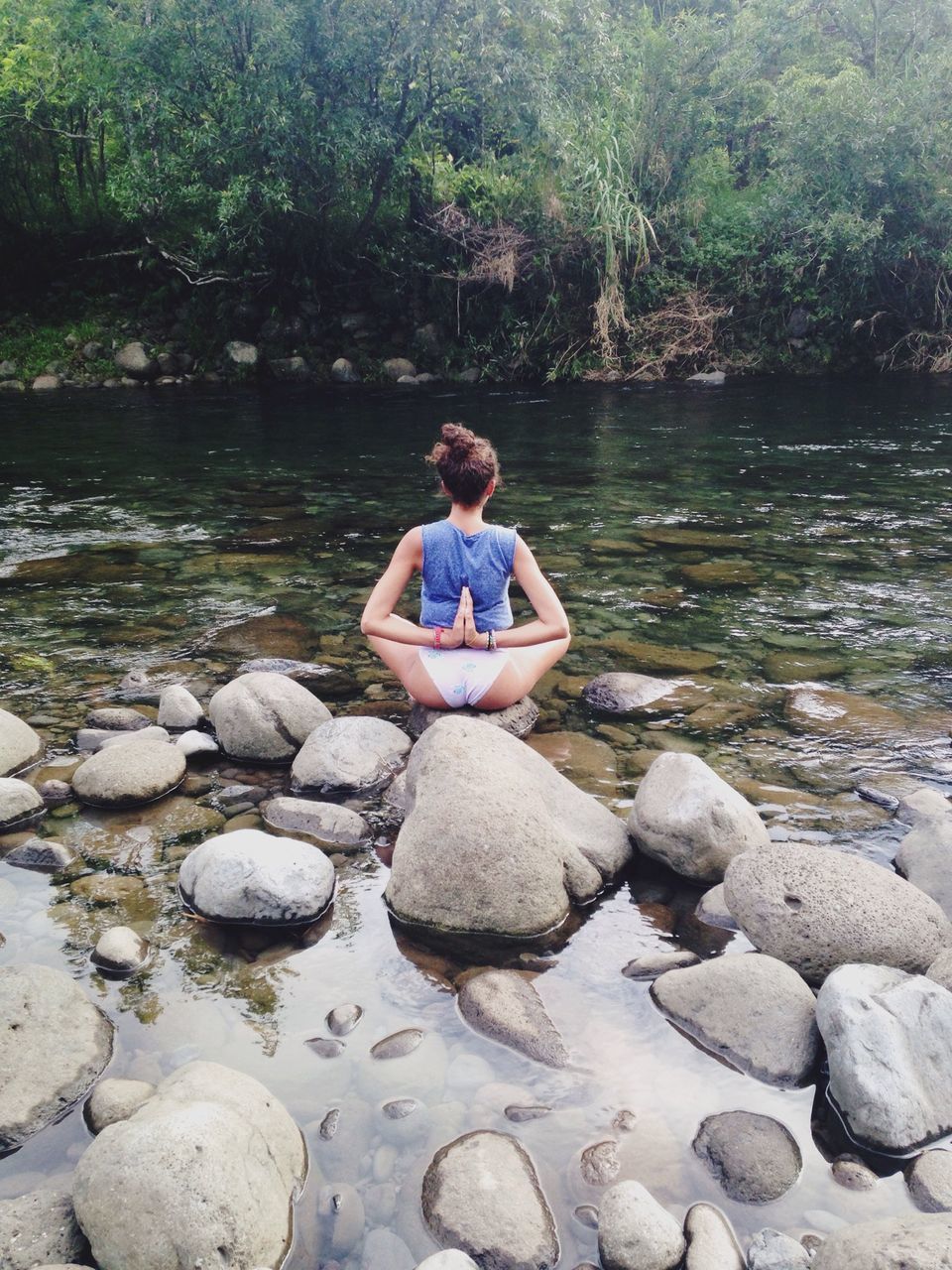 water, lifestyles, leisure activity, person, casual clothing, full length, rock - object, young adult, portrait, looking at camera, sitting, standing, lake, nature, tree, front view, young women, river