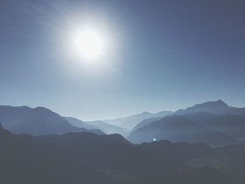 Scenic view of silhouette mountains against clear sky