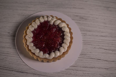 High angle view of cupcakes in plate on table