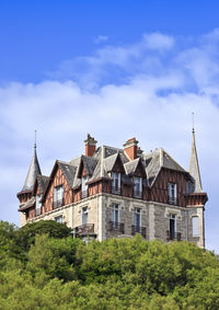 Buildings against blue sky