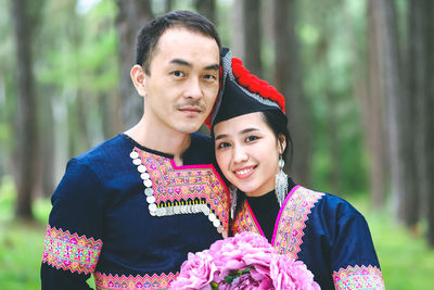 Portrait of smiling young couple